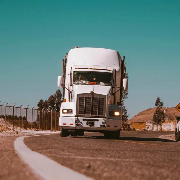Semi truck driving down the highway in Wayne County, NC