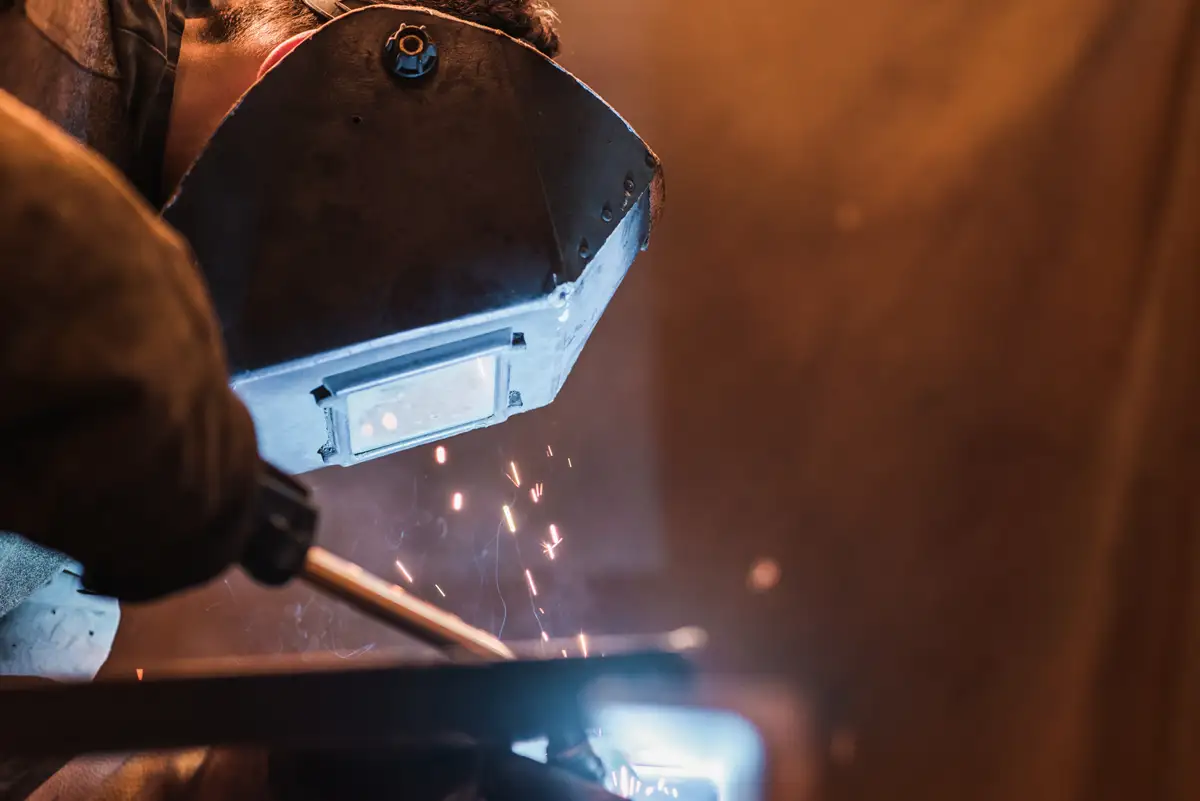 Diesel mechanic performing fabrication service for semi truck in Augusta, GA