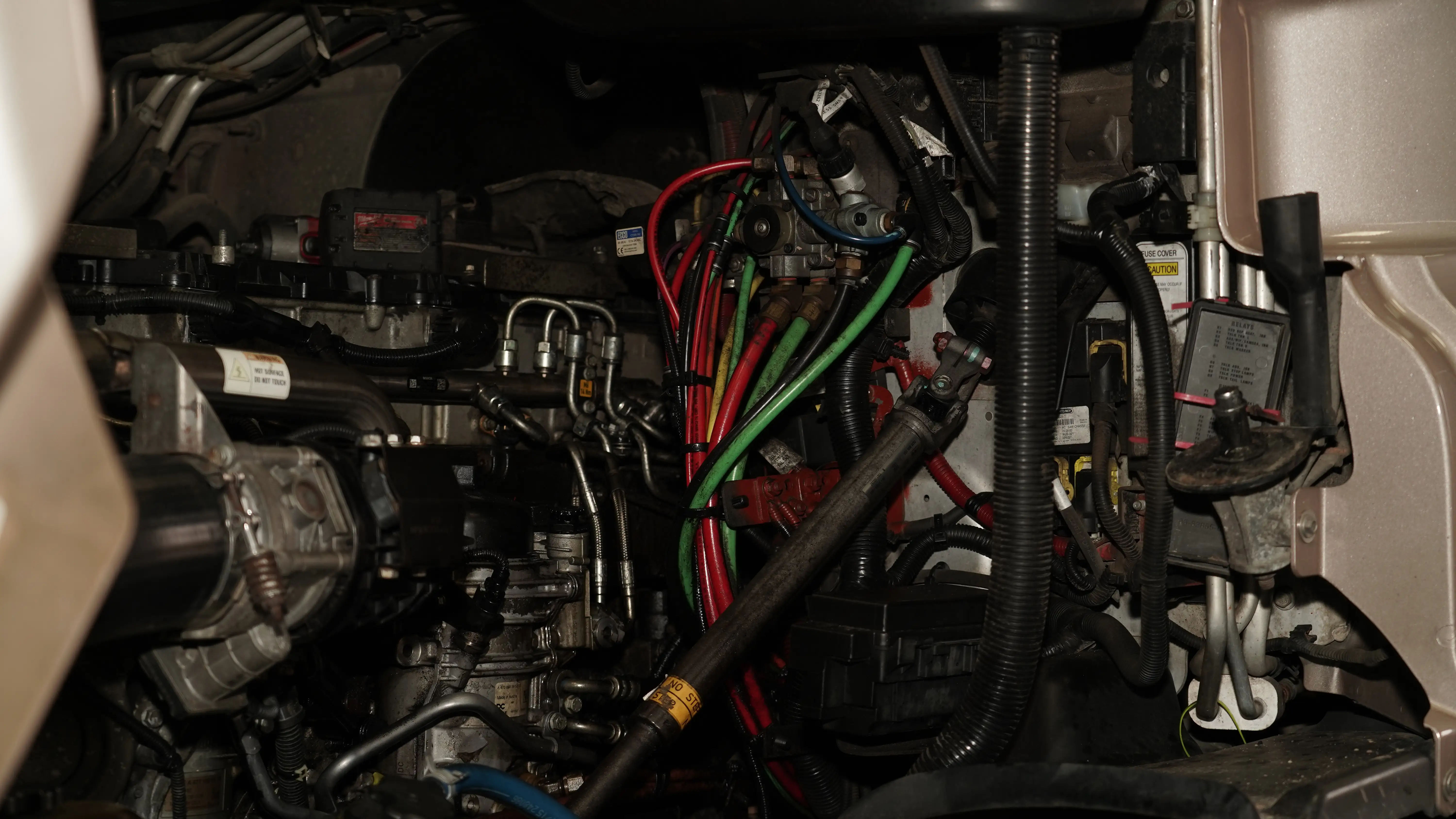 Diesel mechanic performing heavy equipment repairs in Savannah, GA